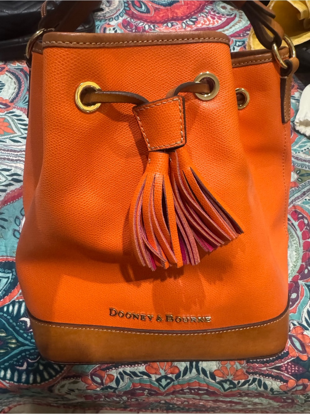 Dooney & Bourke Bright Orange Leather Tassel Drawstring Bucket Bag